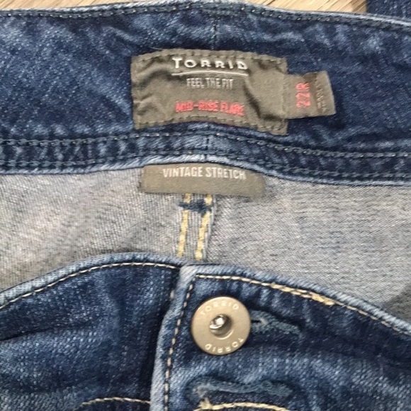 Torrid Mid-Rise Stretch Flare Leg Fray Hem Pork-chop Pocket Distressed Jeans - Picture 8 of 12